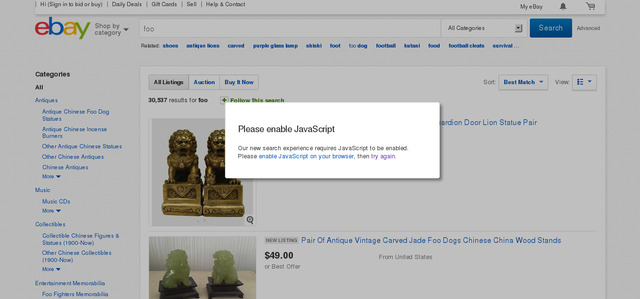 A message box with the text "Please enable javascript" overlaid on a ebay.com page