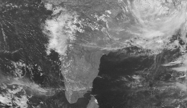 Weather image showing the Indian peninsula and the Arabian sea with some cloud cover. Only the northern part of Sri Lanka is visible.